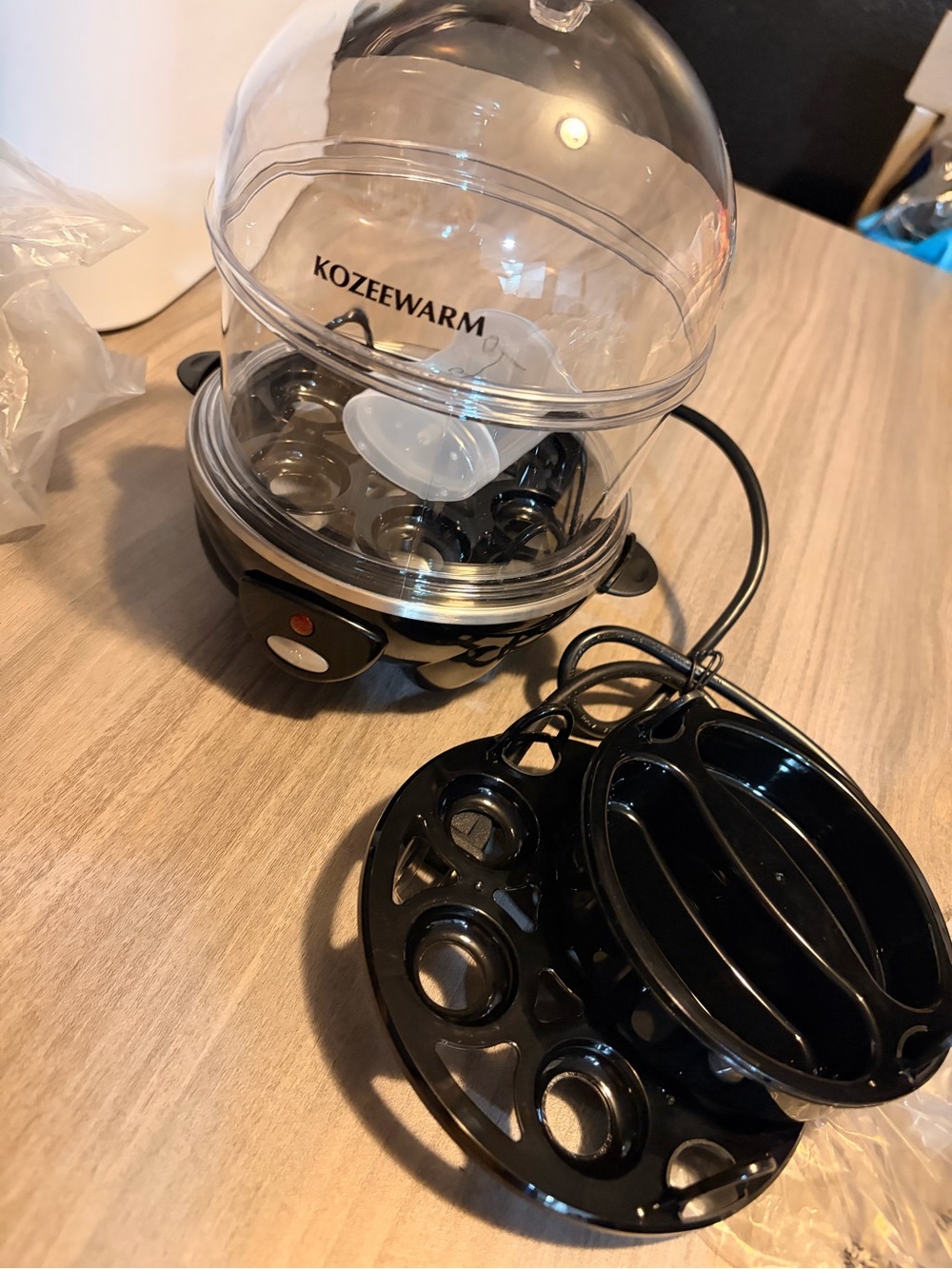 KOZEEWARM Electric Egg Cooker in Black and Clear